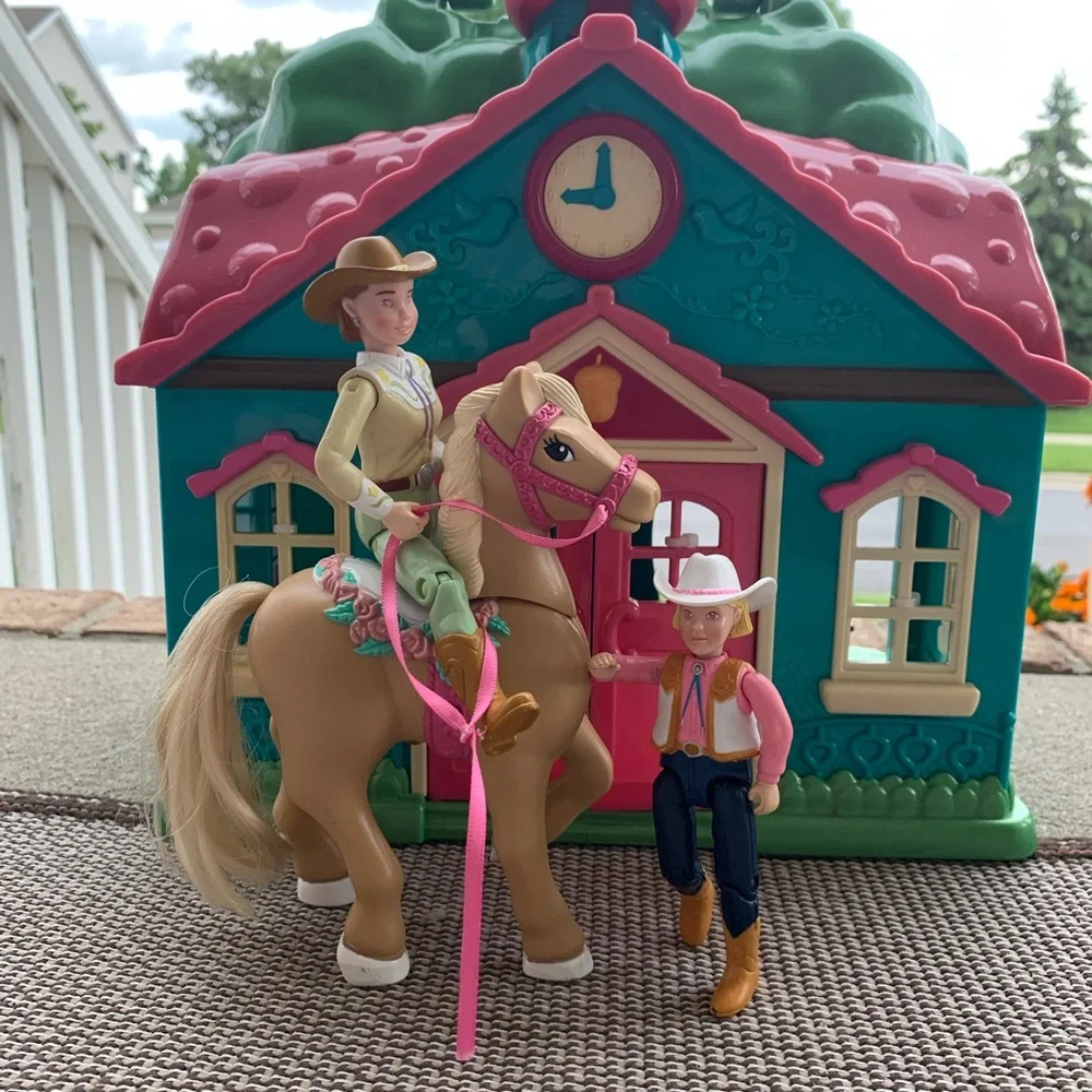 Cowgirl dolls, horse, house, and furniture playset